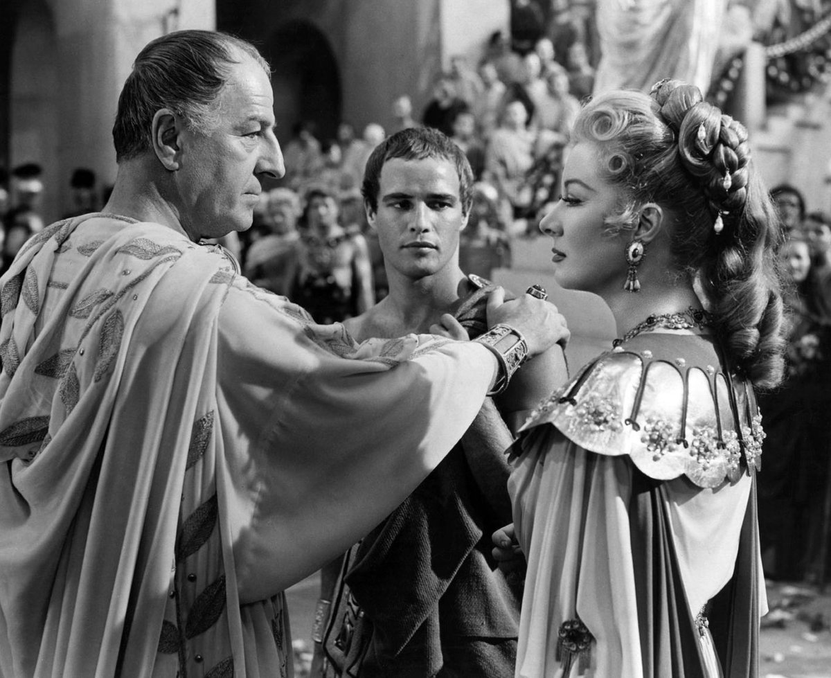 Louis Calhern as Julius Caesar, Marlon Brando as Mark Antony, and Greer Garson as Calpurnia. 1953.