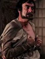 Richard Johnson as Cassius, baring his breast