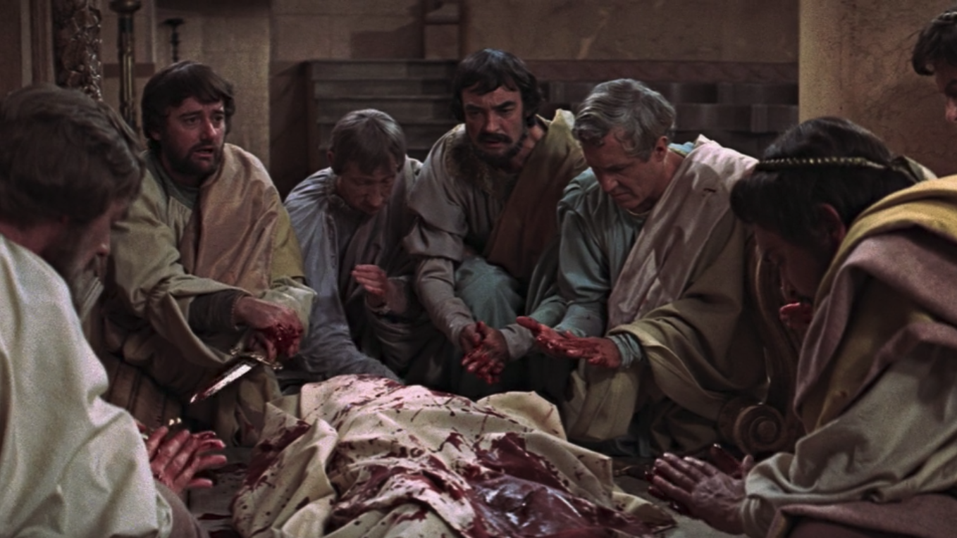 The conspirators, with bloody hands, over the body of Caesar