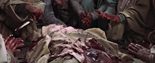 bloody hands over body of Caesar