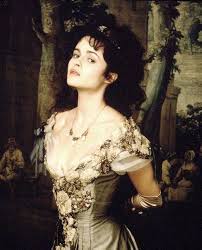 Olivia in a gold evening dress