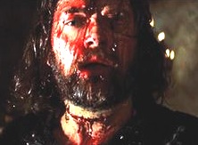 Banquo with a bloody face and a cut throat