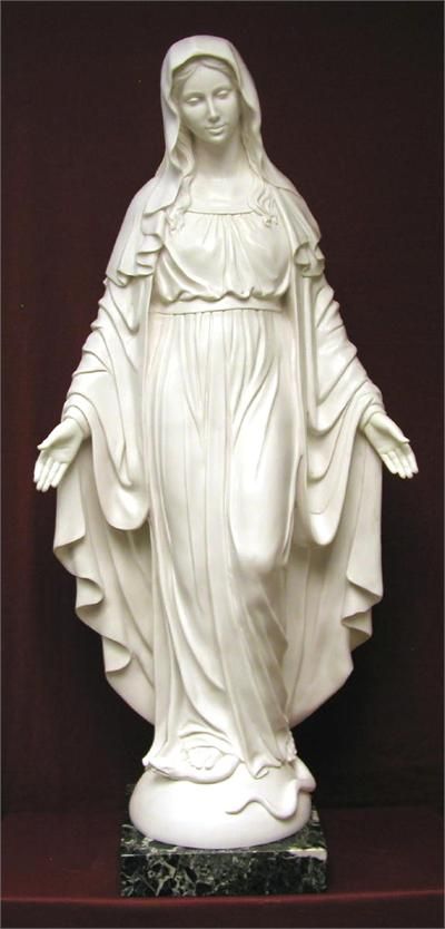 Photo of a statue of the Virgin Mary in pure white alabaster